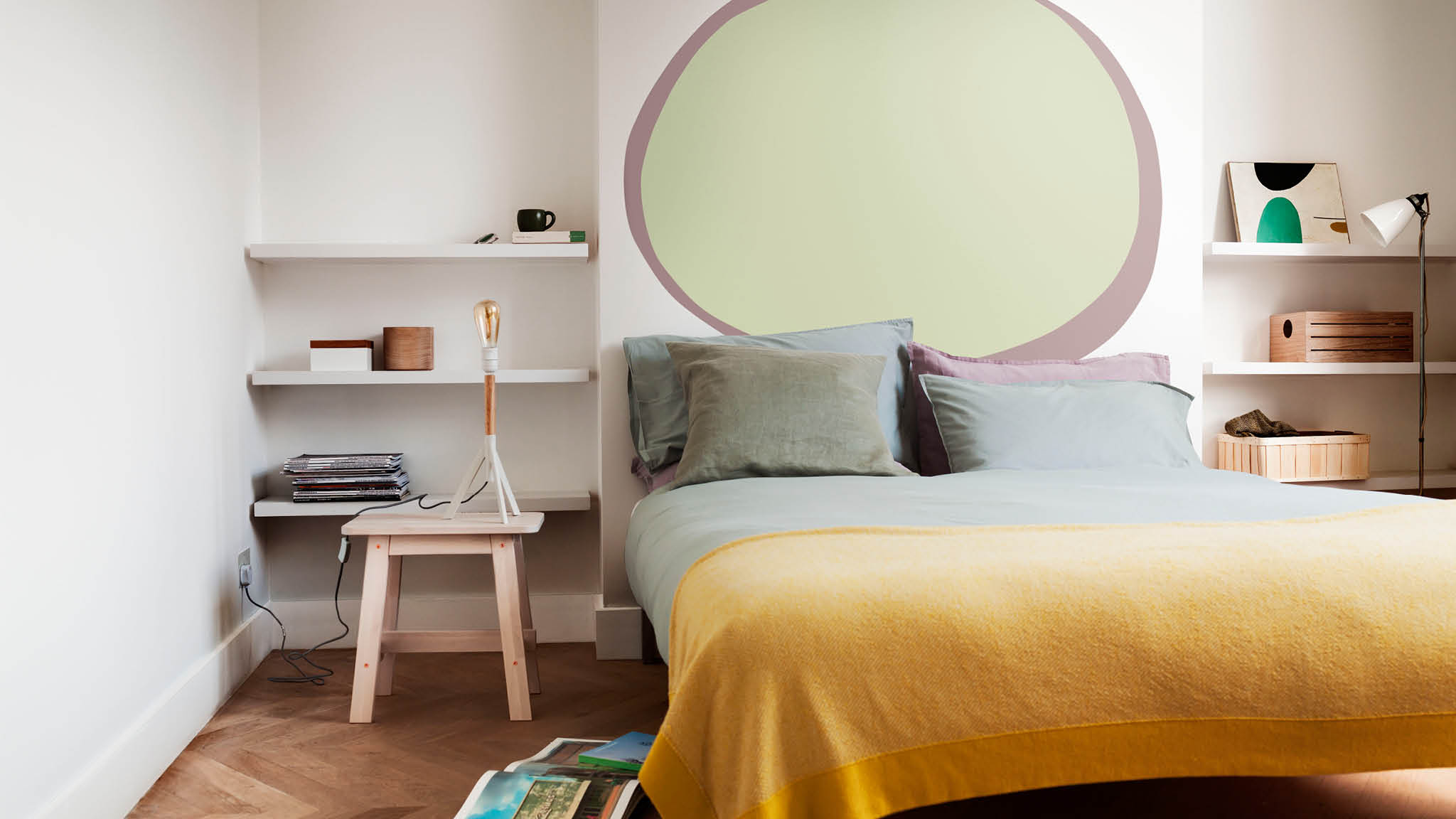 Bedroom with a painted oval on the wall Bedroom with a painted oval on the wall
